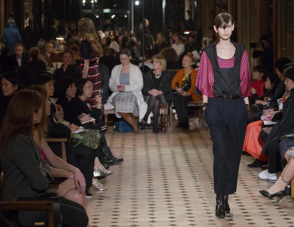 A model wears a creation by French fashion designer Christophe Lemaire for Hermes Ready to Wear's Fall-Winter 2013-2014 fashion collection, presented, Tuesday, March 5, 2013 in Paris. (AP Photo/Jacques Brinon)'s