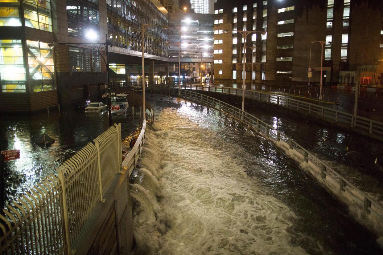 Seawater floods the entrance to the Brooklyn Battery Tunnel during Superstorm Sandy in New York on Oct. 29, 2012. (Photo: John Minchillo/AP)