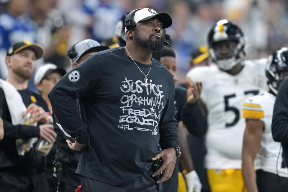 Pittsburgh Steelers head coach Mike Tomlin looks at the scoreboard during the first half of an NFL football game against the Indianapolis Colts in Indianapolis Saturday, Dec. 16, 2023. (AP Photo/Michael Conroy)