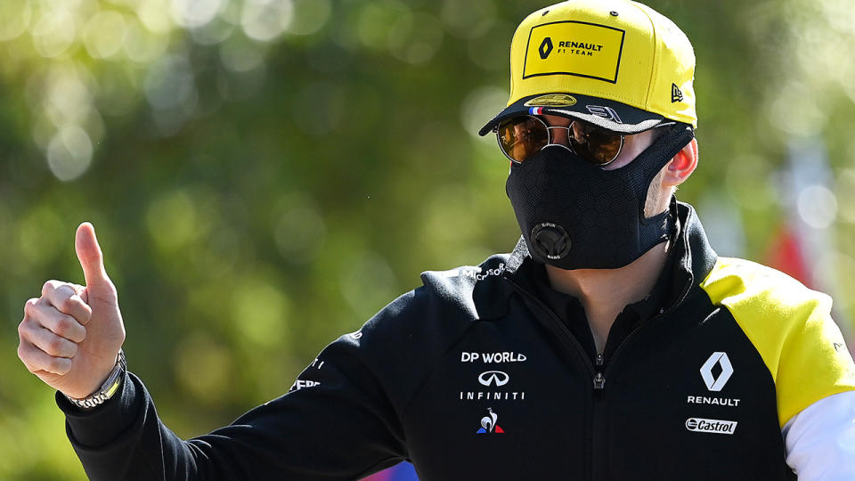 Renault F1 driver Esteban Ocon is pictured arriving at the Australian GP wearing a facemask.