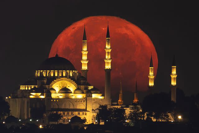 <p>Ahmet Okatali/Anadolu via Getty</p> Rare super blue moon in Istanbul