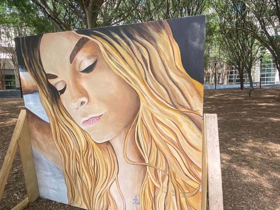 A painting of Mary Santina Collins outside of the Mecklenburg County Courthouse on Thursday, June 30.