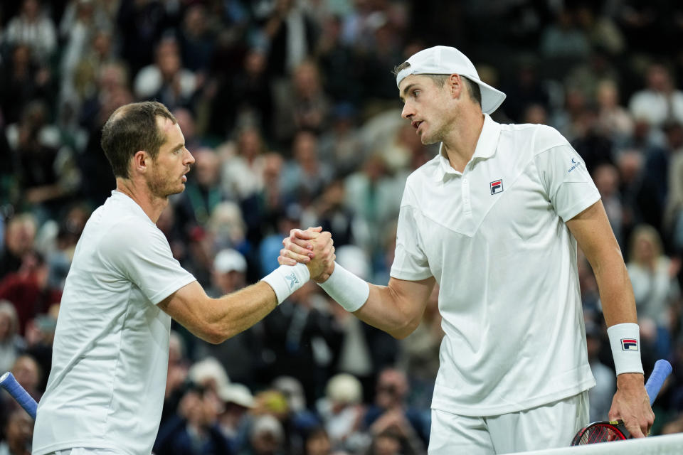 Andy Murray and John Isner, pictured here shaking hands after their clash at Wimbledon.