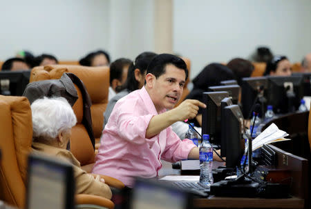 Deputy of the Sandinista National Liberation Front and president of the Economic Commission, Walmaro Gutierrez speaks during the session for the approval of a loan of 100 million dollars from Taiwan for budget support, in the Nicaraguan parliament building in Managua, Nicaragua February 19, 2019.REUTERS/Oswaldo Rivas