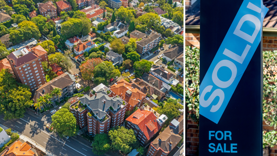 Sydney property market. Aerial view of suburbs. Sold sign.