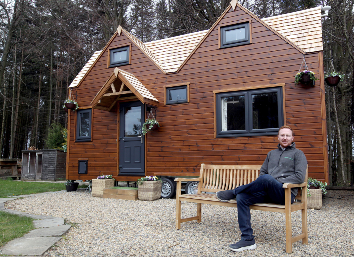 Chris Marsh lives in a tiny eco-home he built in a friend's garden. (Caters)