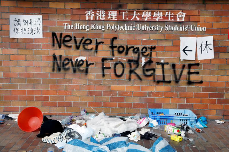 FILE PHOTO: Graffiti is seen on a wall of the campus of the Polytechnic University (PolyU) in Hong Kong