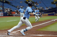 Tampa Bay Rays' Kevin Kiermaier watches his RBI single off Baltimore Orioles pitcher Jorge Lopez during the first inning of a baseball game Saturday, June 12, 2021, in St. Petersburg, Fla. (AP Photo/Chris O'Meara)