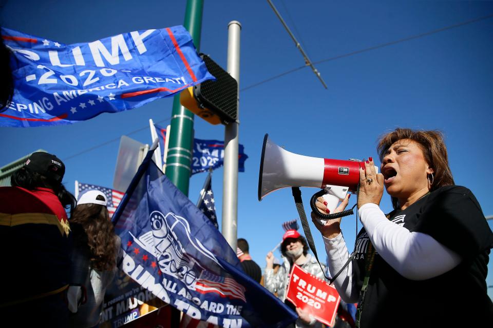 Irene Armendariz-Jackson speaks to Trump supporters at the "El Paso Freedom March" Jan. 6, 2021 in Downtown El Paso. Armendariz-Jackson organized the march from San Jacinto Plaza, down Oregon to the bridge overlooking Interstate 10.