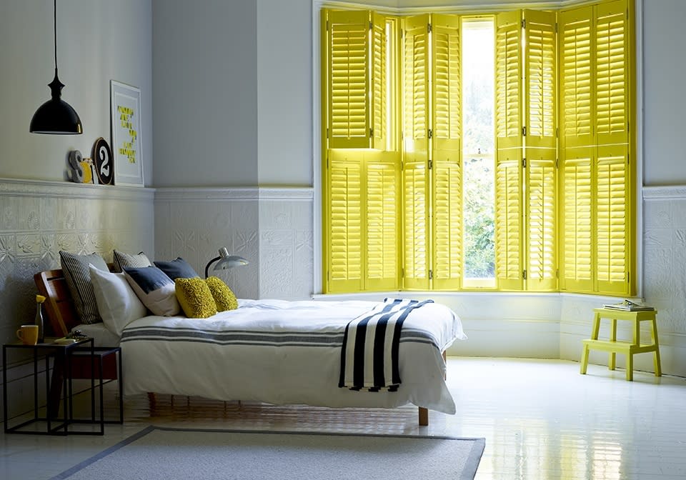 Add energy with canary-colored shutters