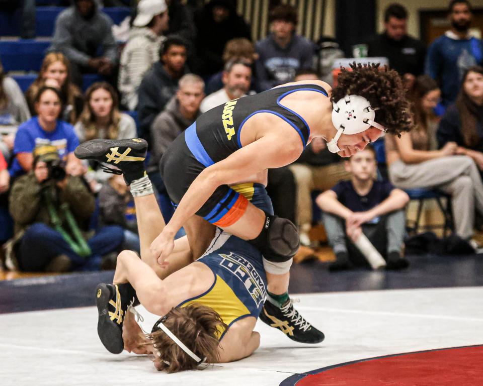 Ashton Kriss (Elco) wrestles Julian Zaragoza (Northern Lebanon) in the 114-pound third place match. The Lancaster Lebanon League Wrestling Championships were held at Manheim Township on Saturday January 27, 2024