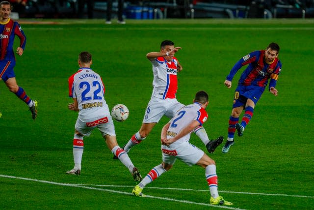 Messi curled home a brilliant second goal on his club record-equalling appearance