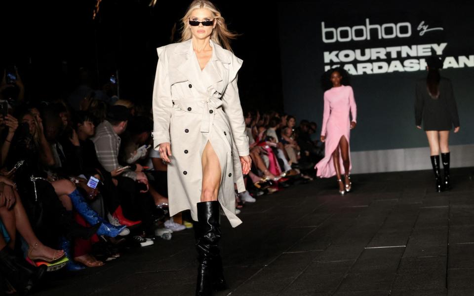  Models present creations by Boohoo X Kourtney Kardashian at the High Line during New York Fashion Week in Manhattan, New York City, U.S., September 13, 2022. - CAITLIN OCHS/ REUTERS