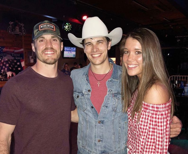 Matt Hinkley (left) came to the rescue when one of his favorite country artists, Randall King (at center), got stuck en route to a concert. (Photo courtesy of Matt Hinkley)