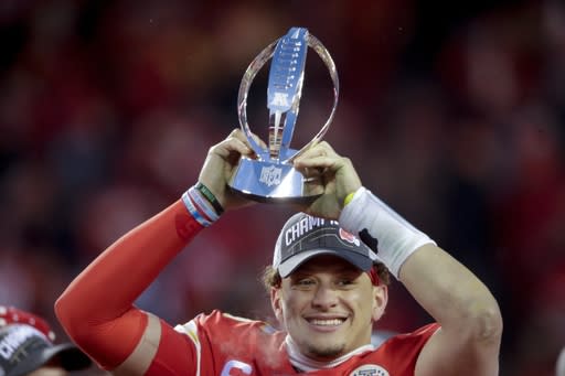Kansas City Chiefs' Patrick Mahomes celebrates with the Kansas City Chiefs after the NFL AFC Championship football game against the Tennessee Titans Sunday, Jan. 19, 2020, in Kansas City, MO. The Chiefs won 35-24 to advance to Super Bowl 54. (AP Photo/Charlie Riedel)