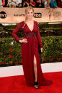 <p>Joanne Froggatt, a member of <i>Downton Abbey’s </i>assembly cast, opted for a long sleeve dress in a deep red. The bodice was embellished with beading and she showed some skin with a deep V and thigh slit. <i>Photo: Getty Images</i></p>