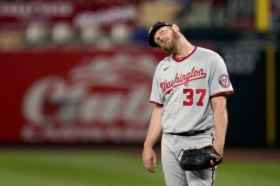 FILE - In this April 13, 2021, file photo, Washington Nationals starting pitcher Stephen Strasburg stands on the mound after giving up a two-run home run to St. Louis Cardinals' Matt Carpenter during the third inning of a baseball game in St. Louis. Strasburg will have season-ending neck surgery, Nationals manager Dave Martinez said Tuesday, July 27, 2021, ending another frustrating year for Washington's 2019 World Series hero.(AP Photo/Jeff Roberson, File)