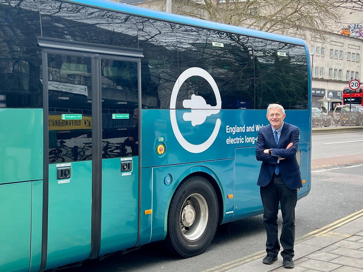 High energy: FlixBus electric coach, along with Simon Calder – thoughtfully wearing a matching  tie  (James Cheung)