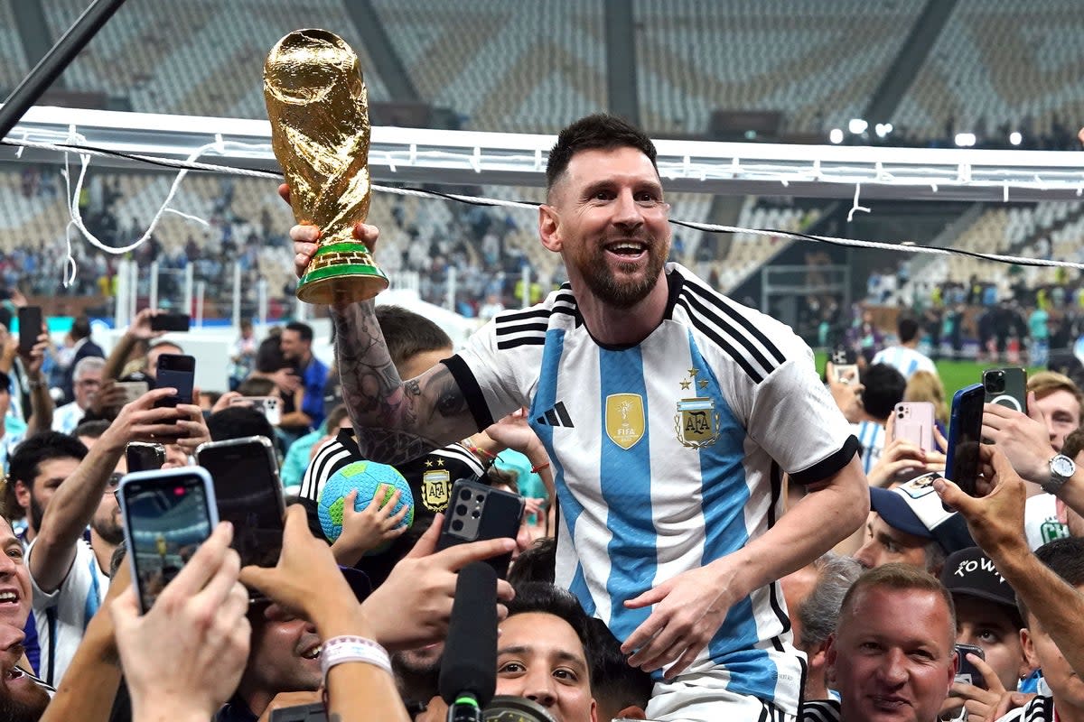 Argentina captain Lionel Messi celebrates World Cup final victory over France (Martin Rickett/PA) (PA Wire)