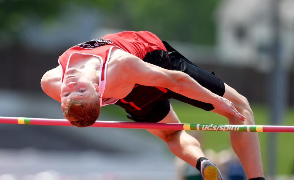 Manchester's Kyle Filkill jumps to a first place finish in Boys High Jump at the 2022 NEO Division II Districts Track & Field  at Salem High School.  Saturday,  May 21, 2022.