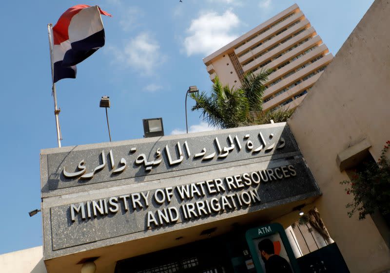 FILE PHOTO: A man past the Ministry of Water Resources and Irrigation headquarters in Cairo during a meeting between Egypt, Ethiopia and Sudan over disputed Nile dam