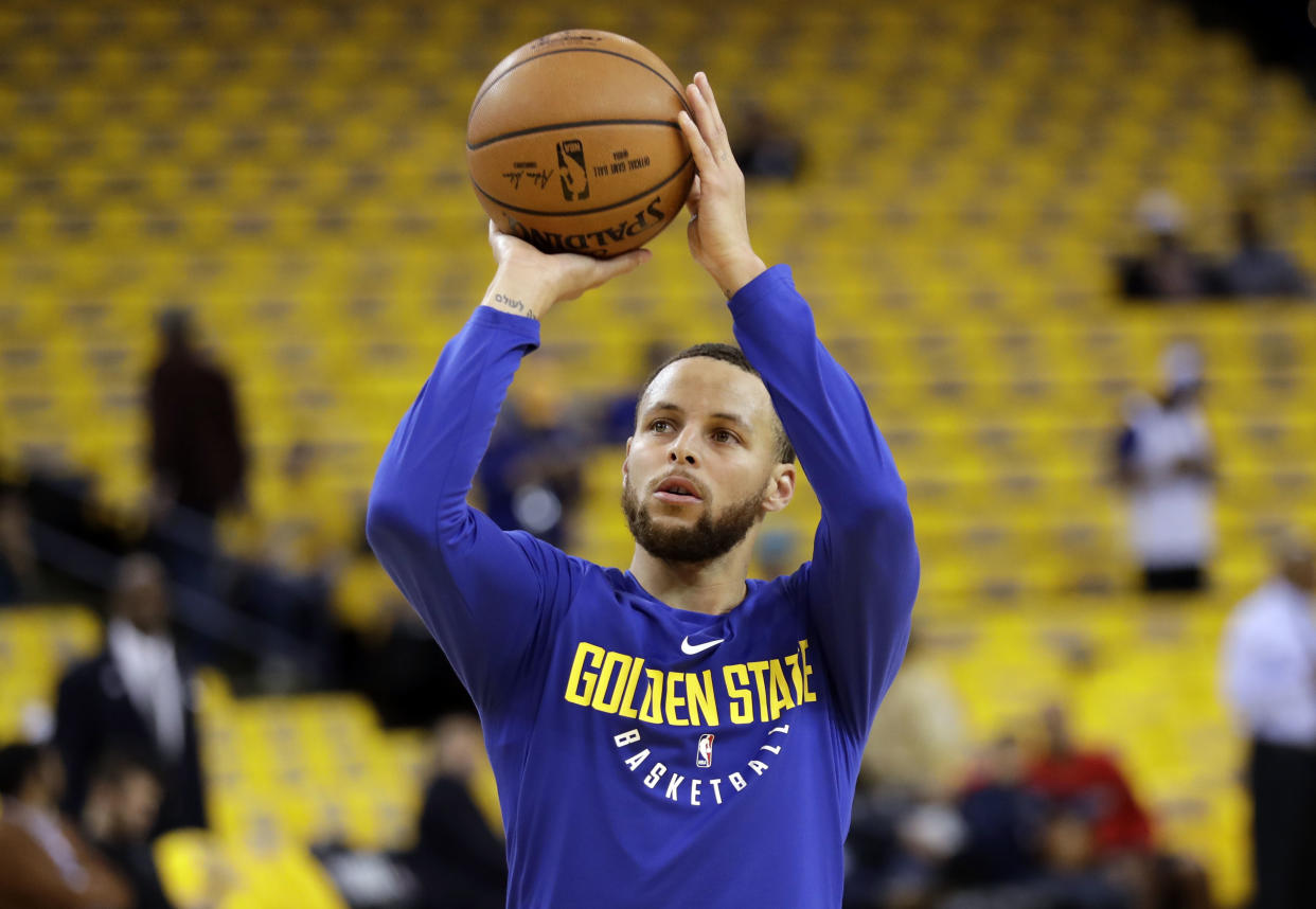 Stephen Curry gets some work in prior to sitting out Game 1 against the New Orleans Pelicans. (AP)