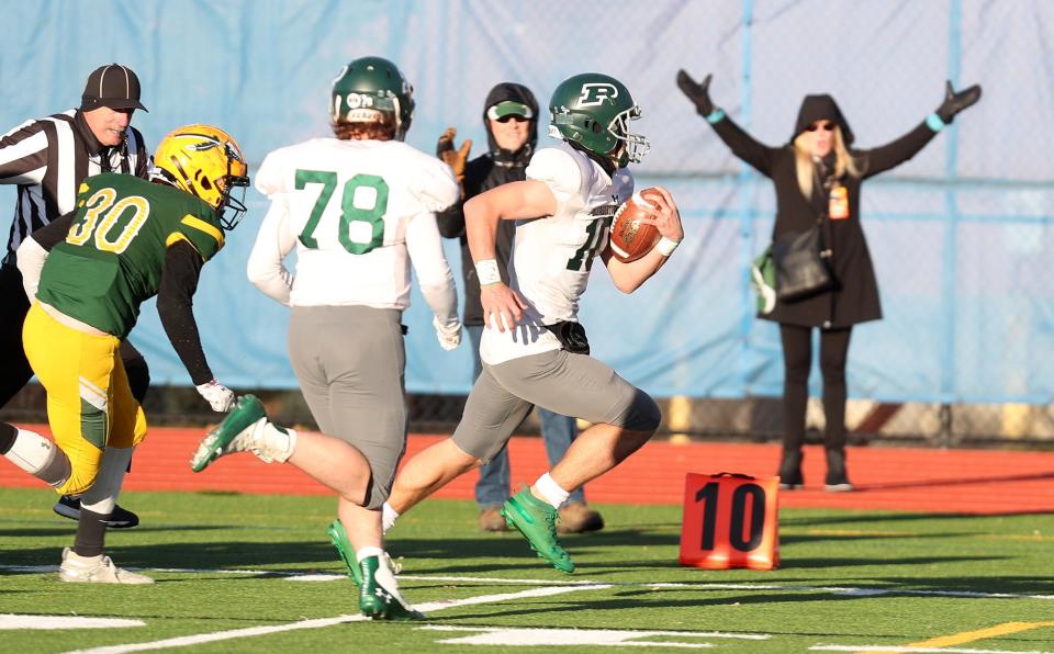 Pleasantville's Daniel Picart (10) runs a punt back for a first half touchdown against Ravena during the Class B state semifinal at Middletown High School Nov. 27, 2021. Pleasantville won the game 15-7.