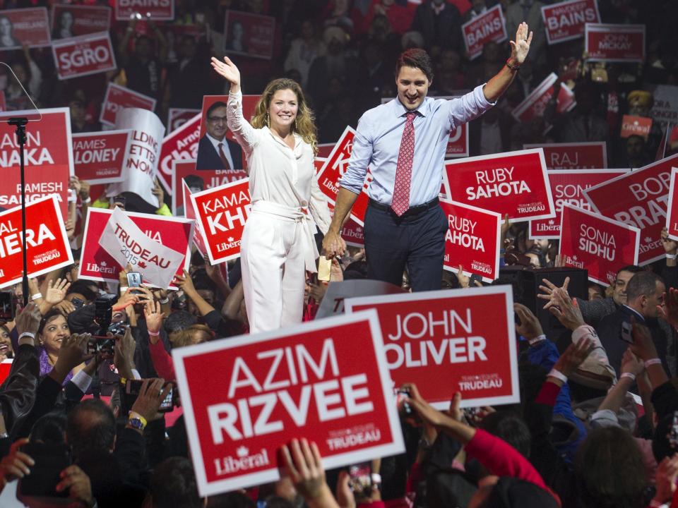 Justin Trudeau and Sophie Gregoire Trudeau at a campaign rally in Brampton, Ontario, Canada October 4, 2015.