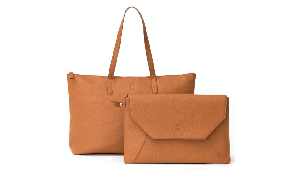 <strong><a href="https://fave.co/2u401sm" target="_blank" rel="noopener noreferrer">Motile's fashionable commuter tote</a></strong> effortlessly goes from conference room to cocktails. It includes a power bank, as well as an interior storage compartment that can be detached and easily accommodates a 13-inch laptop. Its minimalist design puts style and use front-of-mind. It's also water resistant, so there's no fear of your phone getting wet while charging. <strong><a href="https://fave.co/2u401sm" target="_blank" rel="noopener noreferrer">Get it at Walmart, $99</a></strong>.