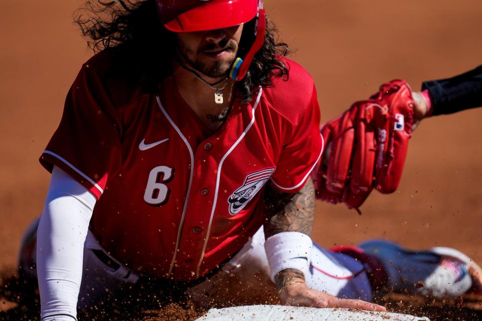 Reds second baseman Jonathan India steals third base in the first inning of a Cactus League spring training game on Feb. 25.