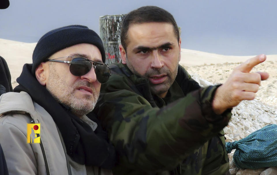 This undated picture released by Hezbollah Military Media, shows senior Hezbollah commander Wissam Tawil, right, who was killed in Kherbet Selem village, south Lebanon, on Monday, Jan. 8, 2024, gesturing next of slain Hezbollah top commander Mustafa Badreddine, who was killed in Syria on May 2016. An Israeli airstrike killed Tawil, who is an elite Hezbollah commander in southern Lebanon, the latest in an escalating exchange of strikes along the border that have raised fears of another Mideast war even as the fighting in Gaza exacts a mounting toll on civilians.(Hezbollah Military Media, via AP)