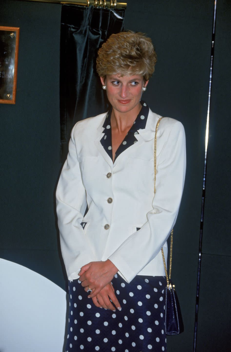 <p>While in Cardiff in June 1993, Diana opted for a foolproof outfit combination: a patterned navy and white dress paired with a white blazer.<br></p>