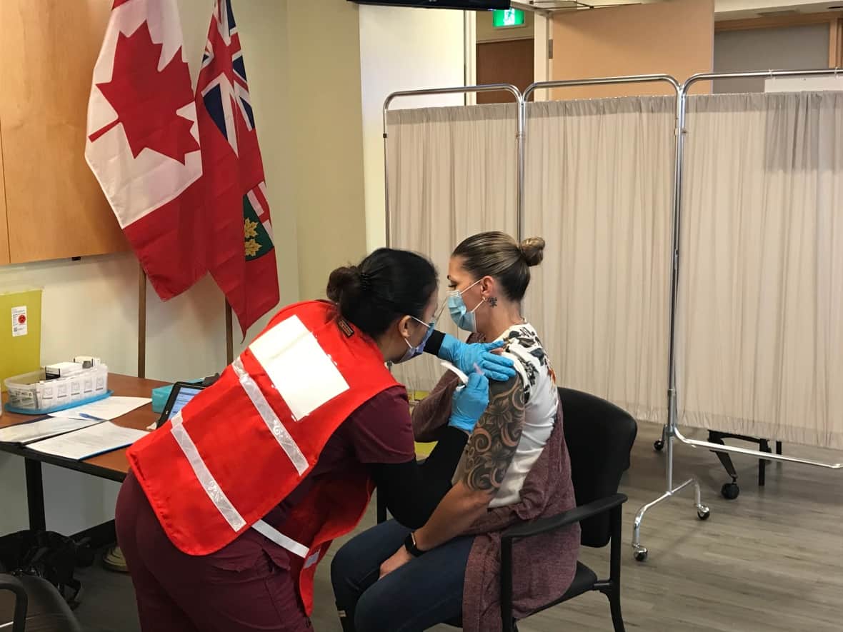 It started here: Jo-Anne Miner, right, received Ottawa's first COVID-19 vaccination at The Ottawa Hospital's Civic campus on Dec. 15, 2020. (Supplied by The Ottawa Hospital - image credit)