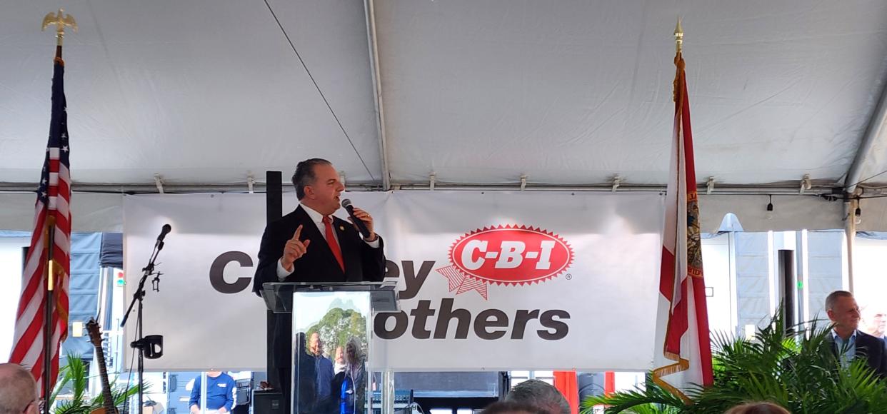 Florida Chief Financial Officer Jimmy Patronis addresses the crowd at the grand opening of the new Cheney Brother distribution center in Port St. Lucie on Jan. 30, 2024.