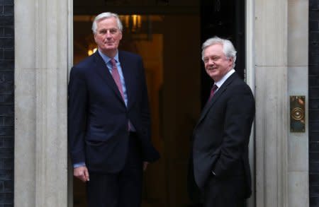 Britain's Secretary of State for Exiting the European Union David Davis welcomes the European Union's chief Brexit negotiator Michel Barnier to Downing Street in London, February 5, 2018. REUTERS/Hannah Mckay