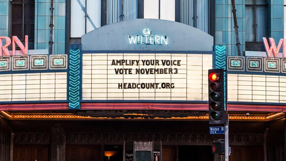 The marquee of the Wiltern in Los Angeles displays a voting message.