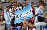 Argentina fans wave flags ahead of the Tri-Nations rugby test between Argentina and the All Blacks in Newcastle, Australia, Saturday, Nov. 28, 2020. (AP Photo/Rick Rycroft)