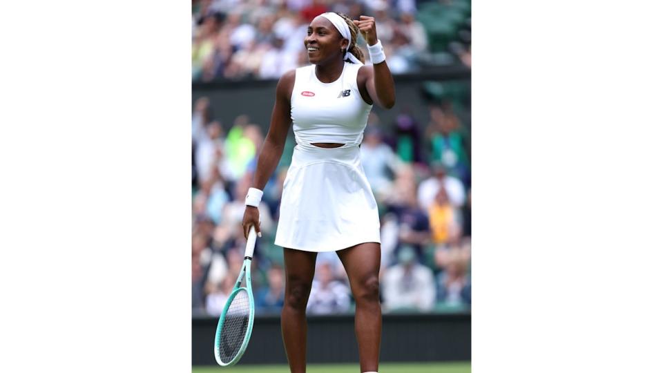 Coco Gauff of United States celebrates against Caroline Dolehide of United States during her Ladies' Singles first round match on day one of The Championships Wimbledon 2024