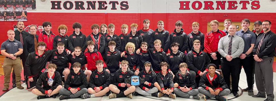 Honesdale's boys varsity wrestling team defeated Western Wayne 35-27 in this year's "battle for the Belt" which took place Wednesday night before an overflow crowd at the HHS high school gym.