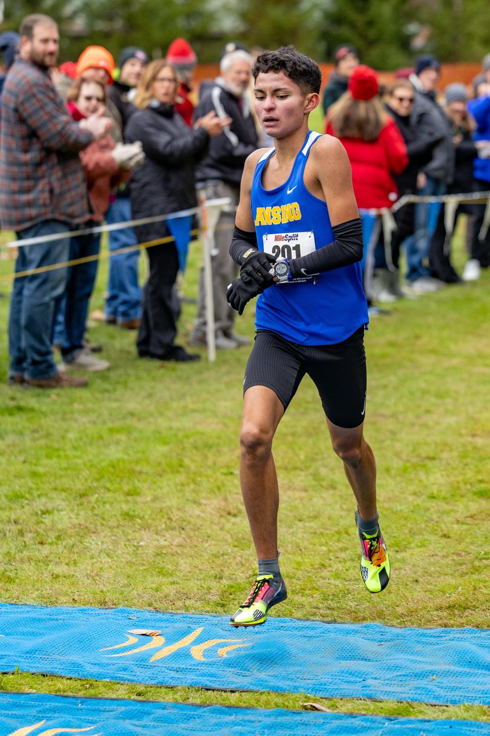 Trent Thibault of Lansing wins the Section IV, Class C, boys cross country championship and qualifies for the state championship round.