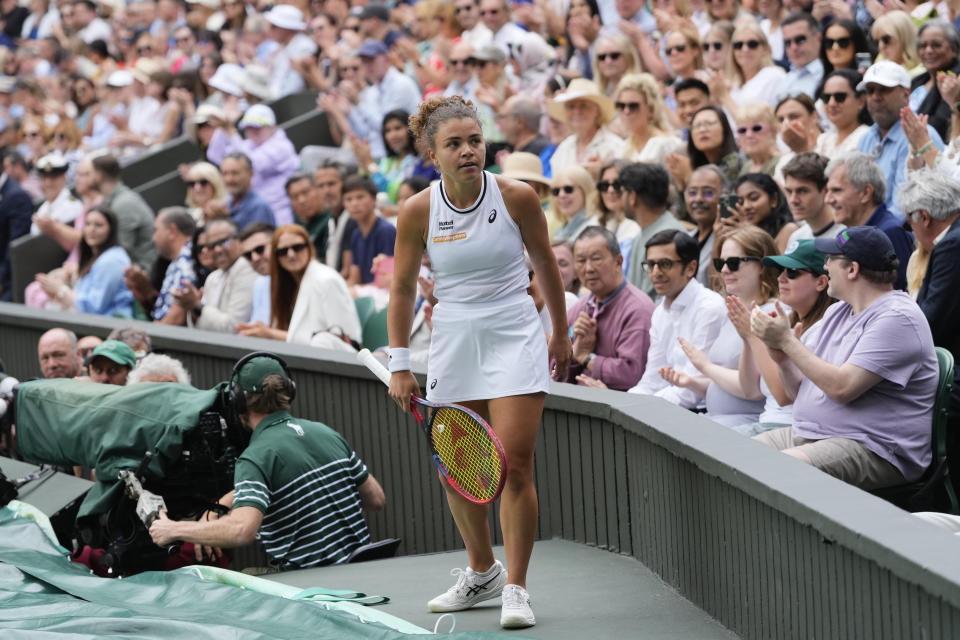 Jasmine Paolini of Italy stands on the edge of the court after attempting a return to Barbora Krejcikova of the Czech Republic during the women's singles final at the Wimbledon tennis championships in London, Saturday, July 13, 2024. (AP Photo/Kirsty Wigglesworth)