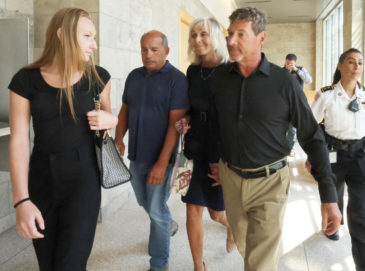 Taunton Mayor Shaunna O'Connell, center, leaves Taunton District Court after her arraignment on Monday, July 22, 2024, with her husband Ted O'Connell, right, and their daughter Riley O'Connell, left. The mayor was arraigned on charges of domestic assault and battery and assault and battery with a dangerous weapon in connection with an incident Friday, July 19, 2024, in which her husband called police.