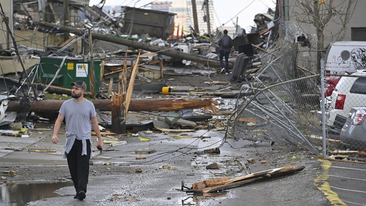 A man views damage in an alley behind Woodland Street after a tornado touched down in Nashville, Tennessee, U.S. March 3, 2020.  REUTERS/Harrison McClary (Photo: Harrison McClary / Reuters)