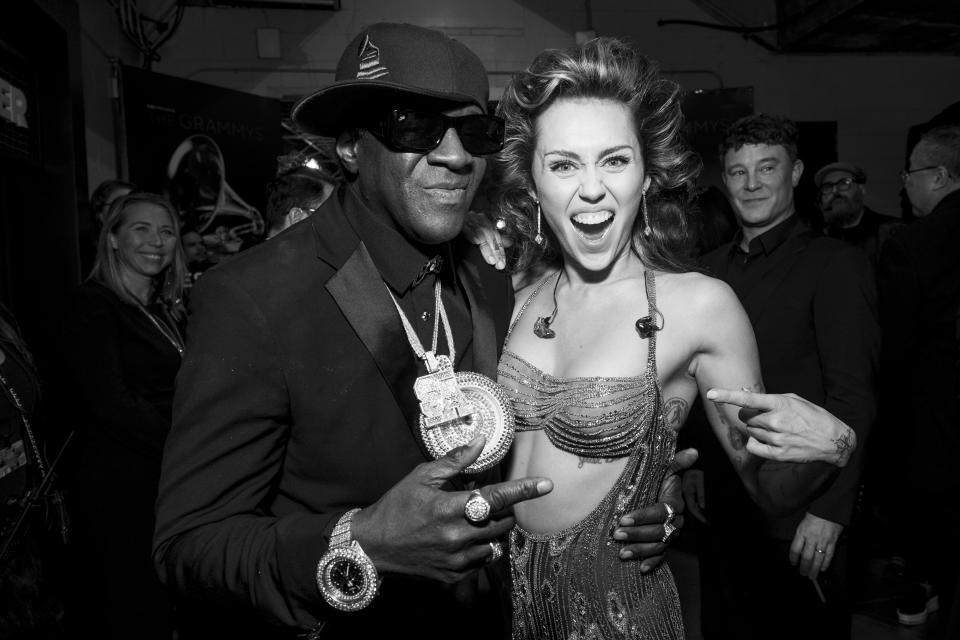 Flavor Flav and Miley Cyrus.