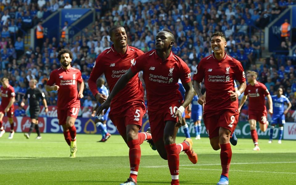 Liverpool players celebrate going in front early at Leicester on Saturday