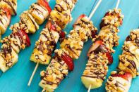 <p>This fun dessert is a healthy, kid-friendly spin on a classic.</p><p>Get the <a href="https://www.delish.com/uk/cooking/recipes/a33122874/banana-split-kebabs/" rel="nofollow noopener" target="_blank" data-ylk="slk:Banana Split Kebabs;elm:context_link;itc:0;sec:content-canvas" class="link ">Banana Split Kebabs</a> recipe.</p>