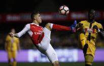 Britain Football Soccer - Sutton United v Arsenal - FA Cup Fifth Round - The Borough Sports Ground - 20/2/17 Arsenal's Gabriel Paulista in action with Sutton United's Kevin Amankwaah Action Images via Reuters / Andrew Couldridge Livepic