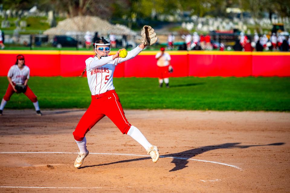 New Bedford's Hayleigh Chenard fires to the plate for the Whalers.