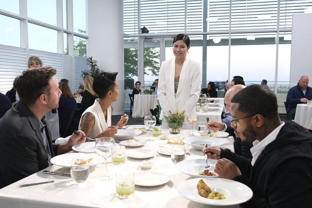"Top Chef" contestant Laura describes her team's Dos by Deul menu to judges Andrew Kroger, Kristen Kish, Tom Colicchio and Kwame Onwauchi during Restaurant Wars