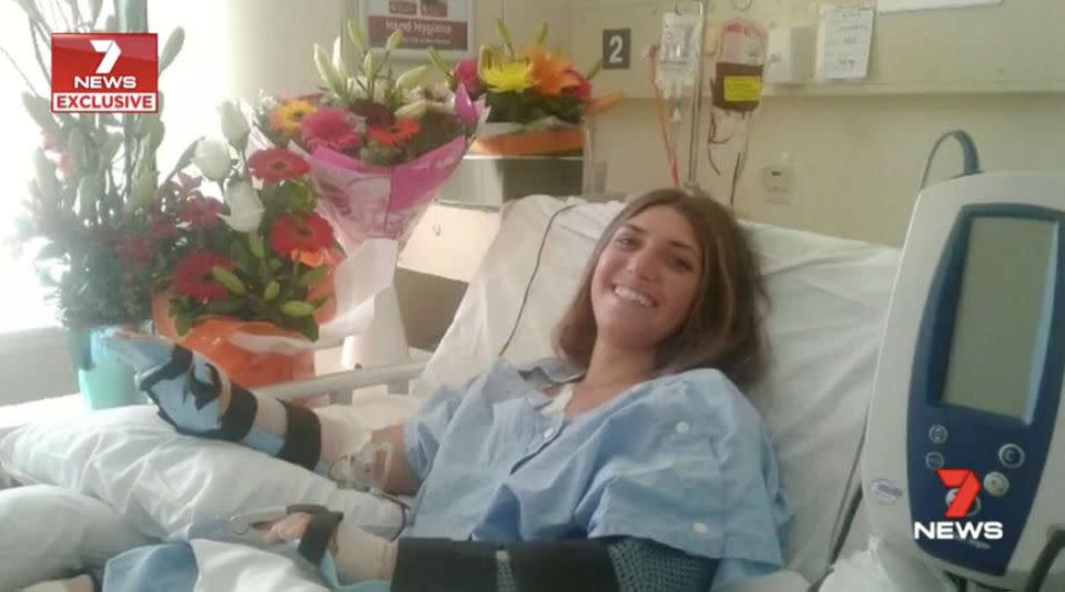 Stella Trevisani manages a smiles from her hospital bed. Source: 7 News